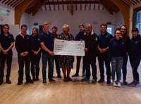 Cheque presented to construction charity