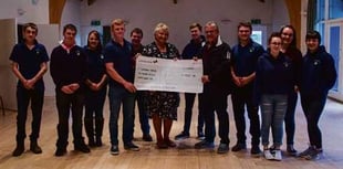 Cheque presented to construction charity