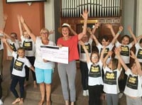 Delight as Bright Sparks receive cheque for £2,000