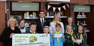 Cheque for £1,000 handed over to Scouts