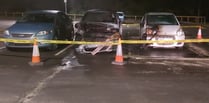 Three vehicles severely damaged after dramatic car park fire