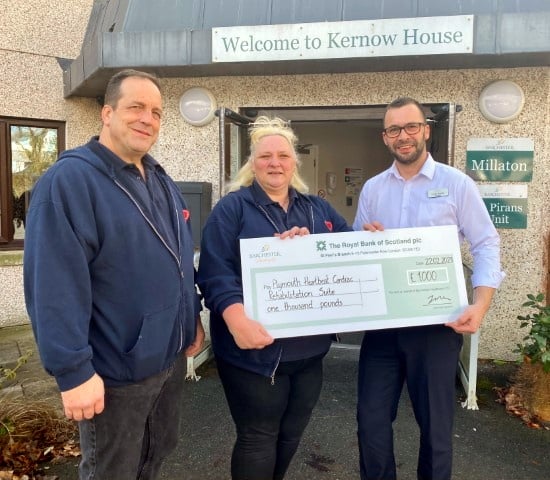 Care home make financial donation to health charity