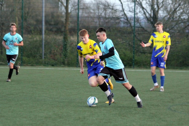 Lifton's Ralph Finnimore tracks the run of North Petherwin's Owen Pennington.