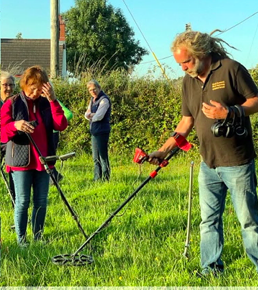 The members having a go under the guidance of Adrian Farquharson from the North Cornwall Metal Detectors