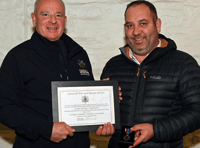 Firefighter hangs up his braces after 30 years in the service