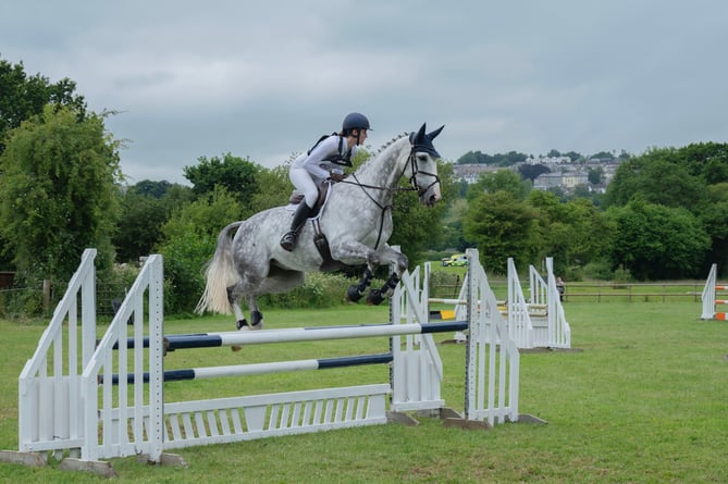 Soaring over the show jump. (Picture: Nicole and Robert Forrester)