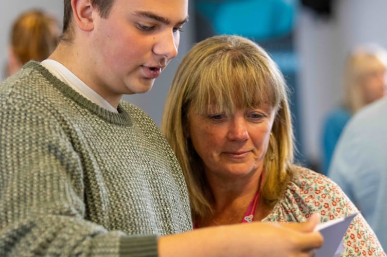 Billy opening his results 