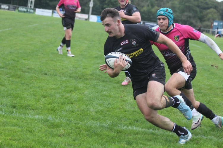 Launceston winger Ollie Bebbington, pictured scoring against Chew Valley earlier in the season, is out injured along with five other regular starters. Picture: Paul Hamlyn