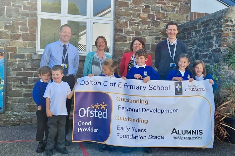 Dolton CofE Primary School staff and students celebrate their success