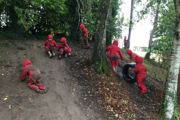 Children even enjoyed a make-shift mud slide