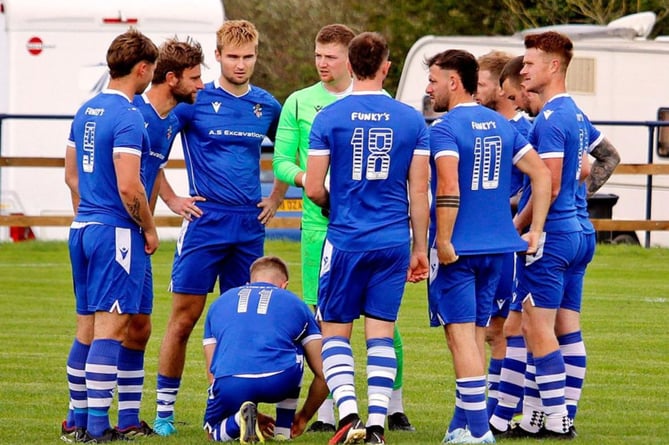 Bude Town's players gee themselves up. Picture: Chris Pointer