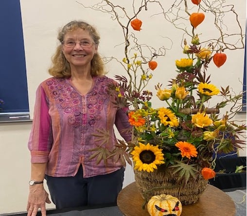 Fiona Hammond with her final arrangement from her display 'Flower Arranging with a difference: Floral Art on the Hoof' at Bude Flower Club