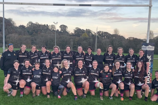 Launceston Ladies, who are pictured with a couple of the under 12s team who enjoyed their afternoon with the senior squad before and after their 29-5 victory over Hornets at Polson Bridge on Sunday. Picture: Launceston Rugby Club