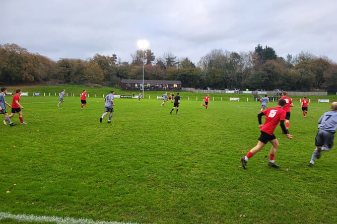 Action from Holsworthy's trip to Callington with the visitors in grey. Picture: Holsworthy AFC