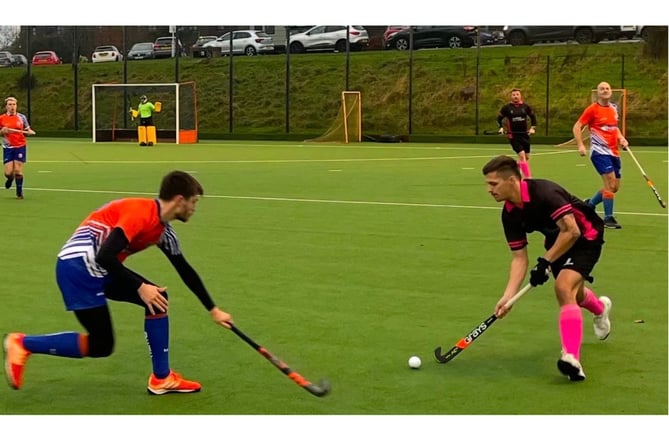 Charlie Falla uses his speed to help take the ball around the Ocean City player. Picture: Andy Davis