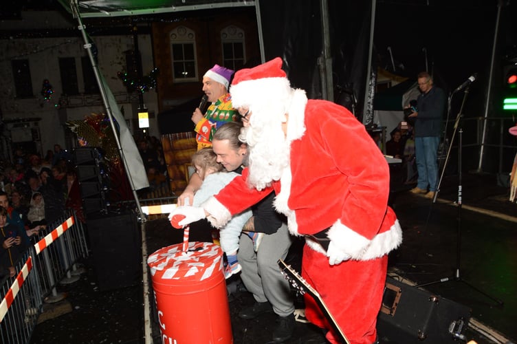 The big switch-on was conducted by Santa with a father and daughter duo. (Picture: Holsworthy Town Council)