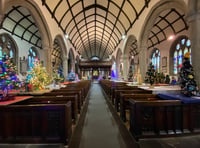 Church gets festive with nearly 100 Christmas trees