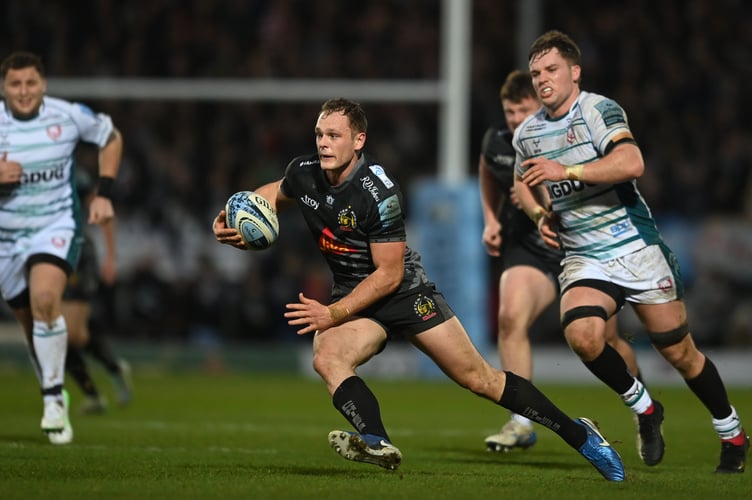 Exeter Chiefs winger Tom Wyatt takes on the Gloucester defence during their Premiership Rugby clash