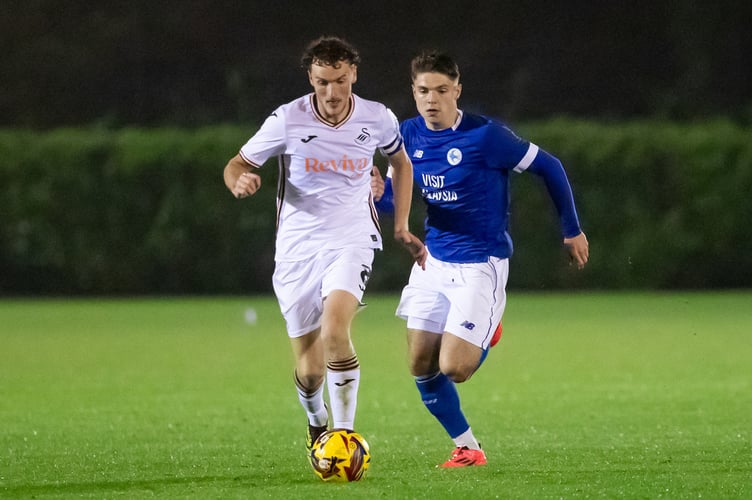 Mitchell Bates of Swansea City attacks during the Professional Development League match between Swansea City and Cardiff City at the Joma High Performance Centre on October 28, 2024 Picture: Athena Pictures/Getty Images