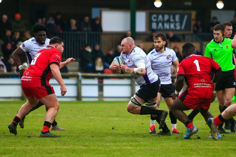 Cornish Pirates forward Alex Everett looks to find a way through the Hartpury defence during Saturday's Championship clash