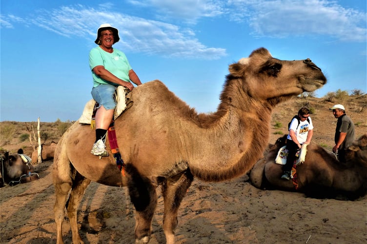 Rosemary Lee riding a camel was among the slides she showed during her talk to the Bude u3a