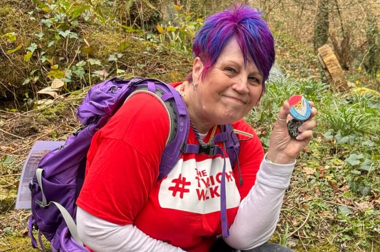 Ellen Yates holding a Twilight Walk rock painted by joint host of the 3k walk Diane Smith. (Picture: Diane Smith)