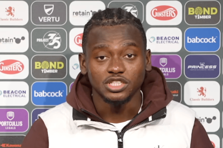 Plymouth Argyle striker Mustapha Bundu addresses the media